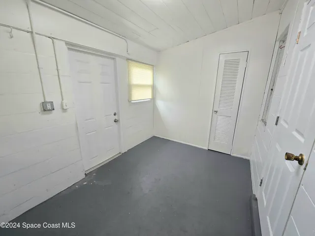 a view of utility room and window