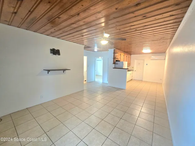 a view of a hallway with closet
