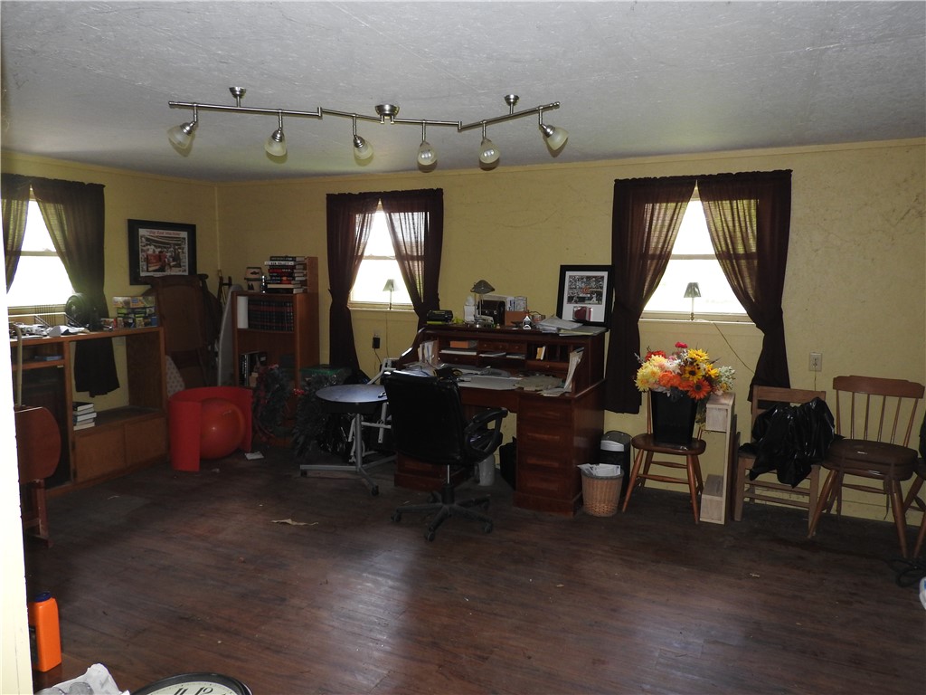 2185 East Loy Road Piqua, OH 45356 - Photo 6 of 19 This versatile room offers ample space for both productivity and relaxation.