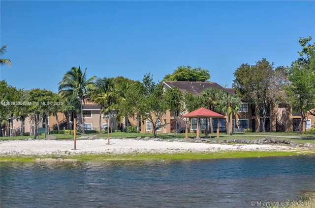 a swimming pool with outdoor seating