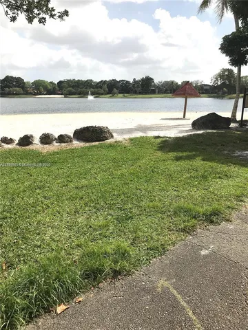 a view of a lake from a yard