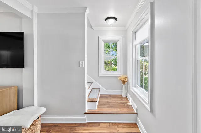 a room with a cabinets and a dresser