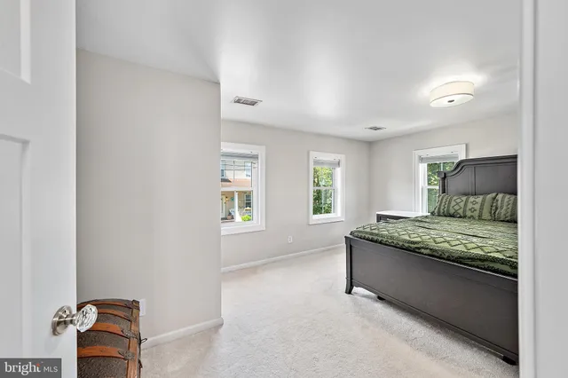 a view of a hallway with washer and dryer