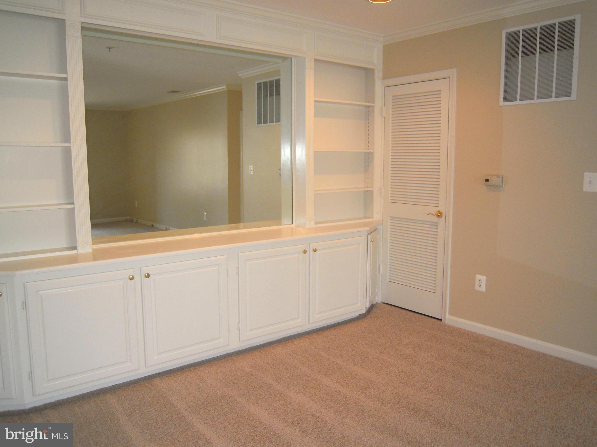 12000 Tralee Road, Unit 302 Lutherville-Timonium, MD 21093 - Photo 13 of 28 an empty room with windows