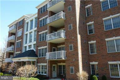 12000 Tralee Road, Unit 302 Lutherville-Timonium, MD 21093 - Photo 27 of 28 a front view of a multi story building