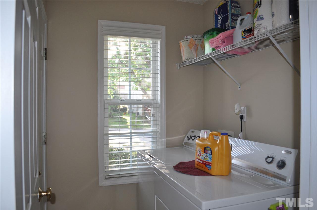 4904 Mocha Lane Raleigh, NC 27616 - Photo 13 of 15 a kitchen with a sink and a window