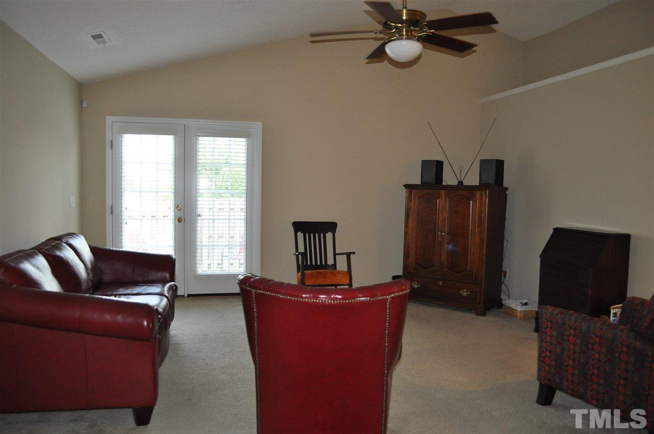 4904 Mocha Lane Raleigh, NC 27616 - Photo 3 of 15 a living room with furniture and a window