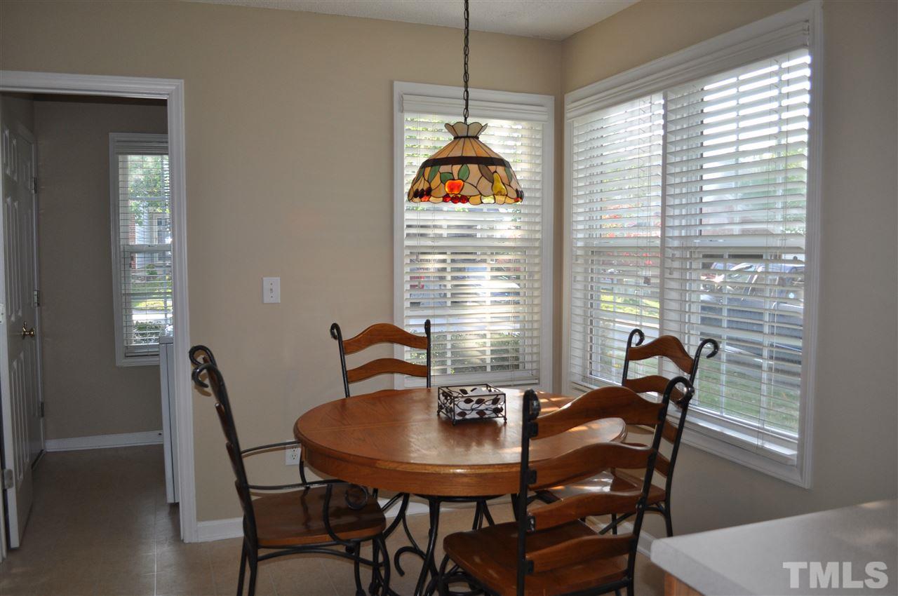 4904 Mocha Lane Raleigh, NC 27616 - Photo 6 of 15 a view of a dining room with furniture and window