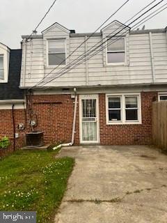 2007 Dineen Drive Baltimore, MD 21222 - Photo 6 of 12 a house that has a big yard in front of it