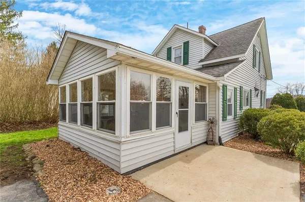 a view of a house with a garden