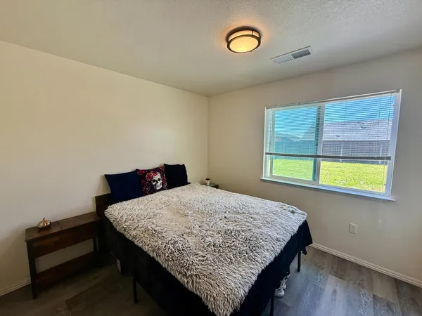 a room with a table and a window