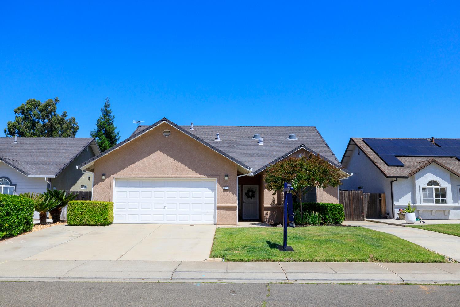 3731 Incline Way Riverbank, CA 95367 - Photo 1 of 49 a front view of a house with a yard