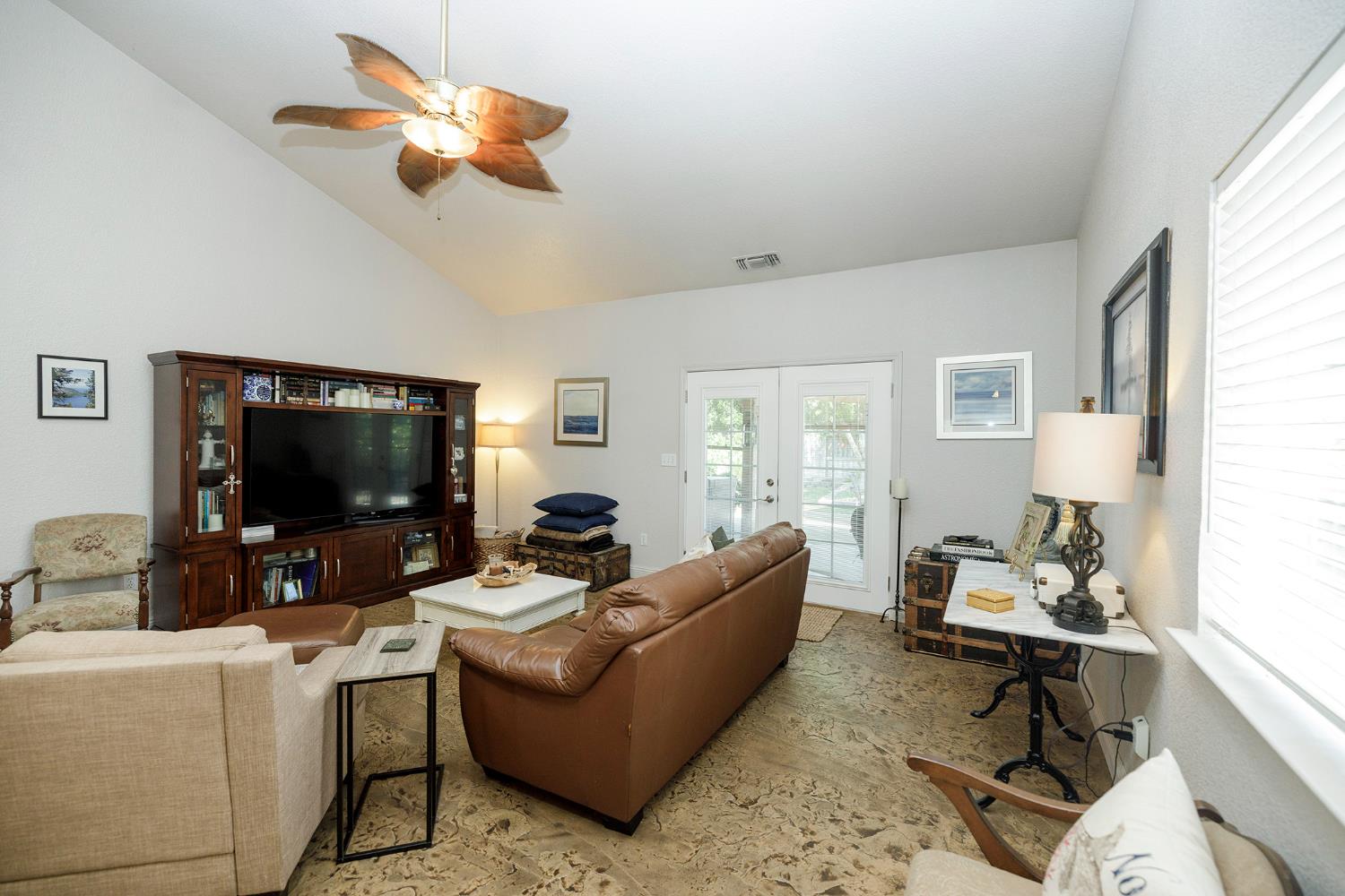 3731 Incline Way Riverbank, CA 95367 - Photo 12 of 49 a living room with furniture and a flat screen tv
