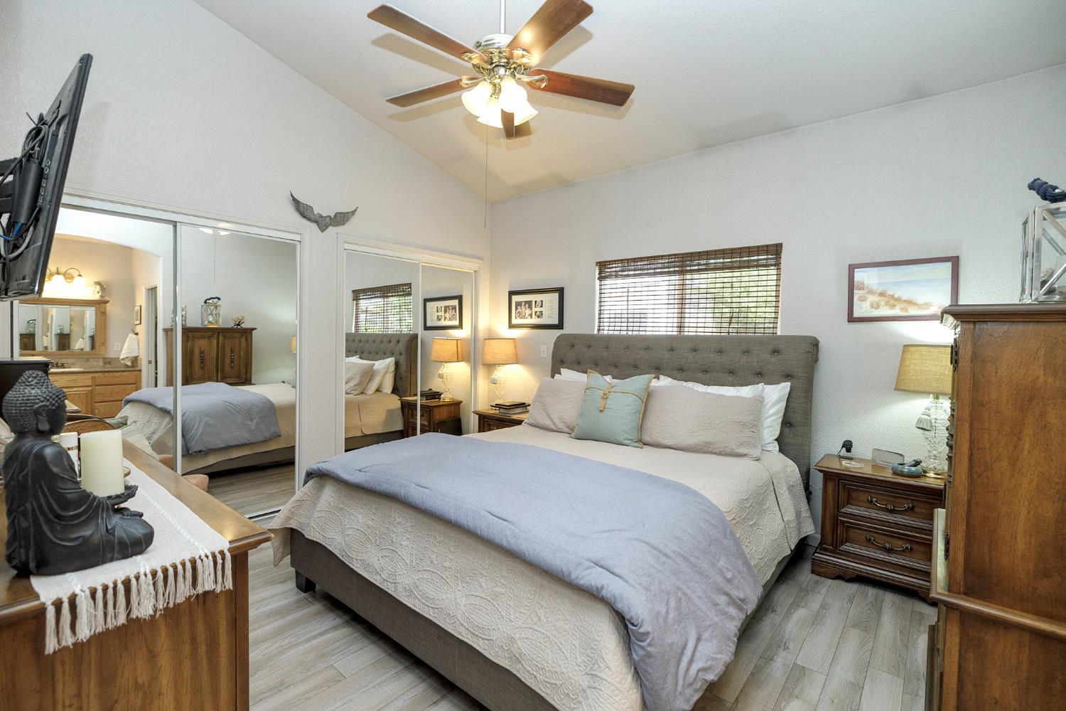 3731 Incline Way Riverbank, CA 95367 - Photo 21 of 49 a bedroom with a bed and wooden floor