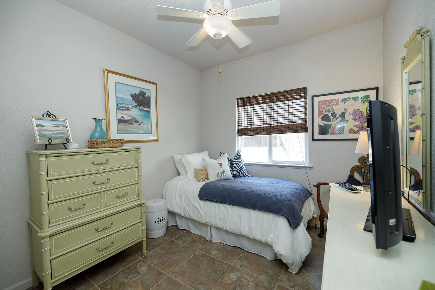 3731 Incline Way Riverbank, CA 95367 - Photo 25 of 49 a bedroom with a bed and a window