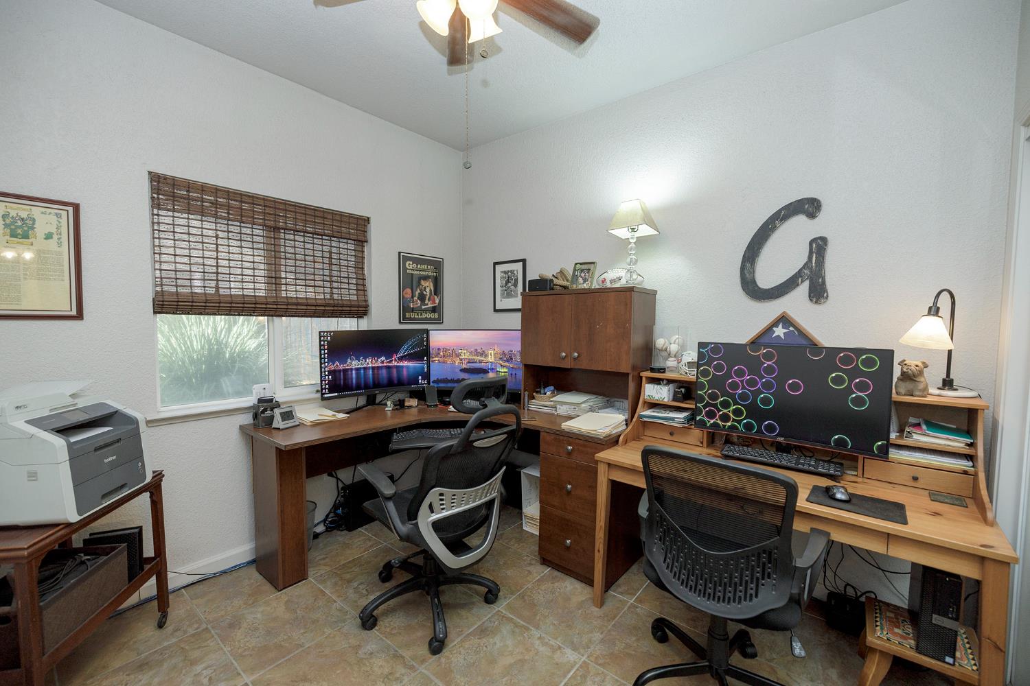 3731 Incline Way Riverbank, CA 95367 - Photo 29 of 49 a view of a workspace with furniture and a window