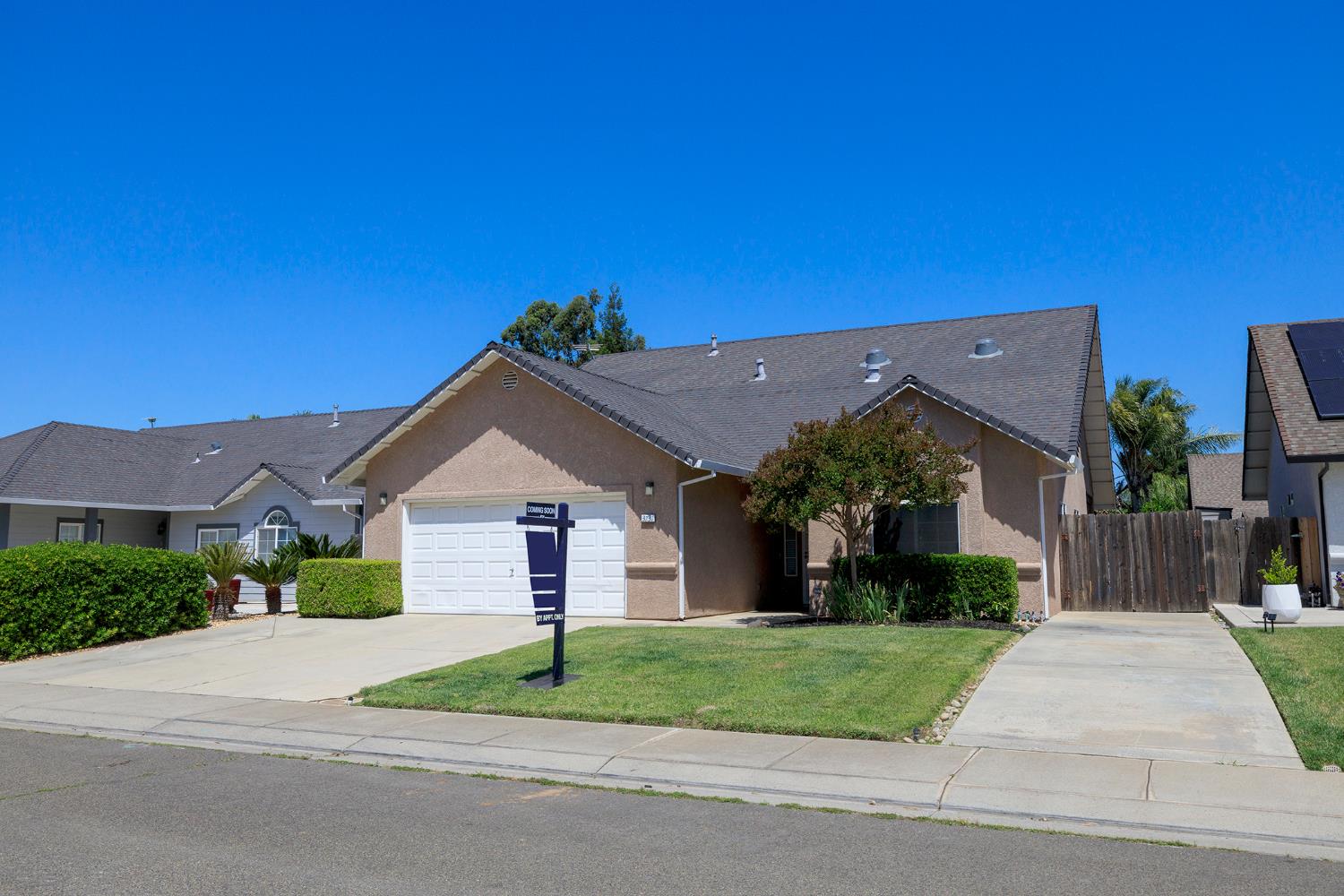 3731 Incline Way Riverbank, CA 95367 - Photo 3 of 49 a front view of a house with a yard and garage