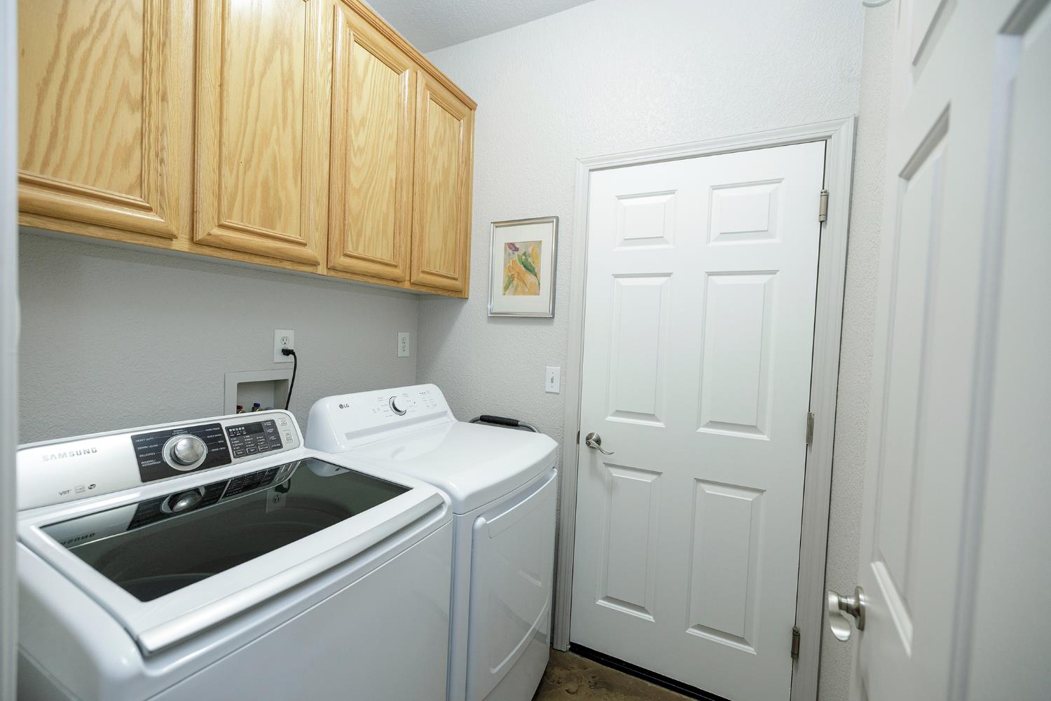3731 Incline Way Riverbank, CA 95367 - Photo 31 of 49 a utility room with dryer and washer