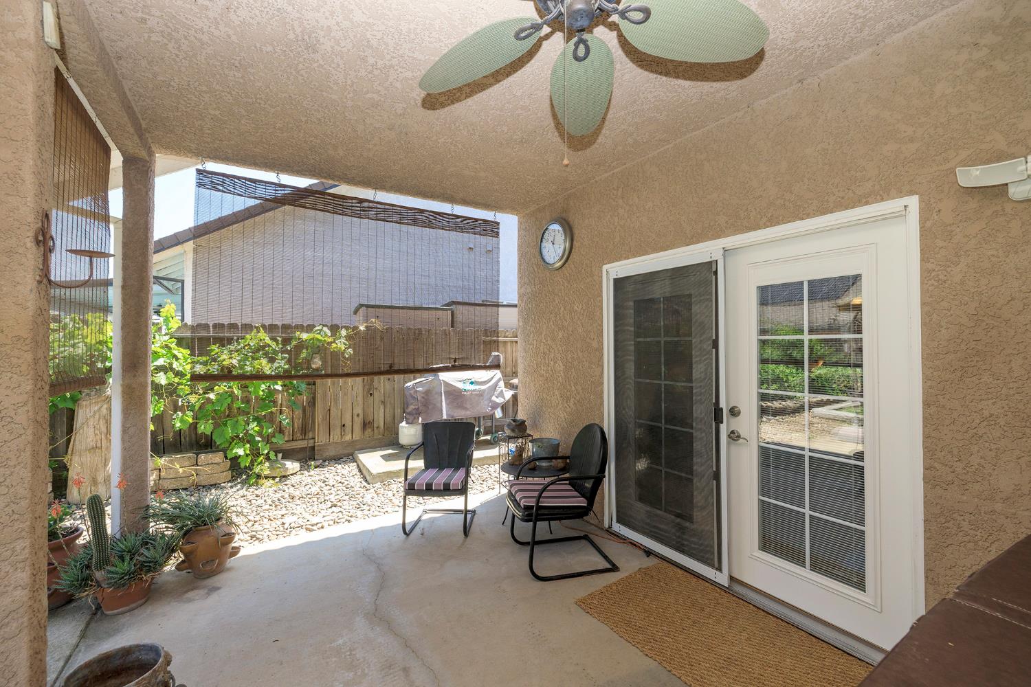 3731 Incline Way Riverbank, CA 95367 - Photo 32 of 49 a building outdoor space with patio furniture and potted plants