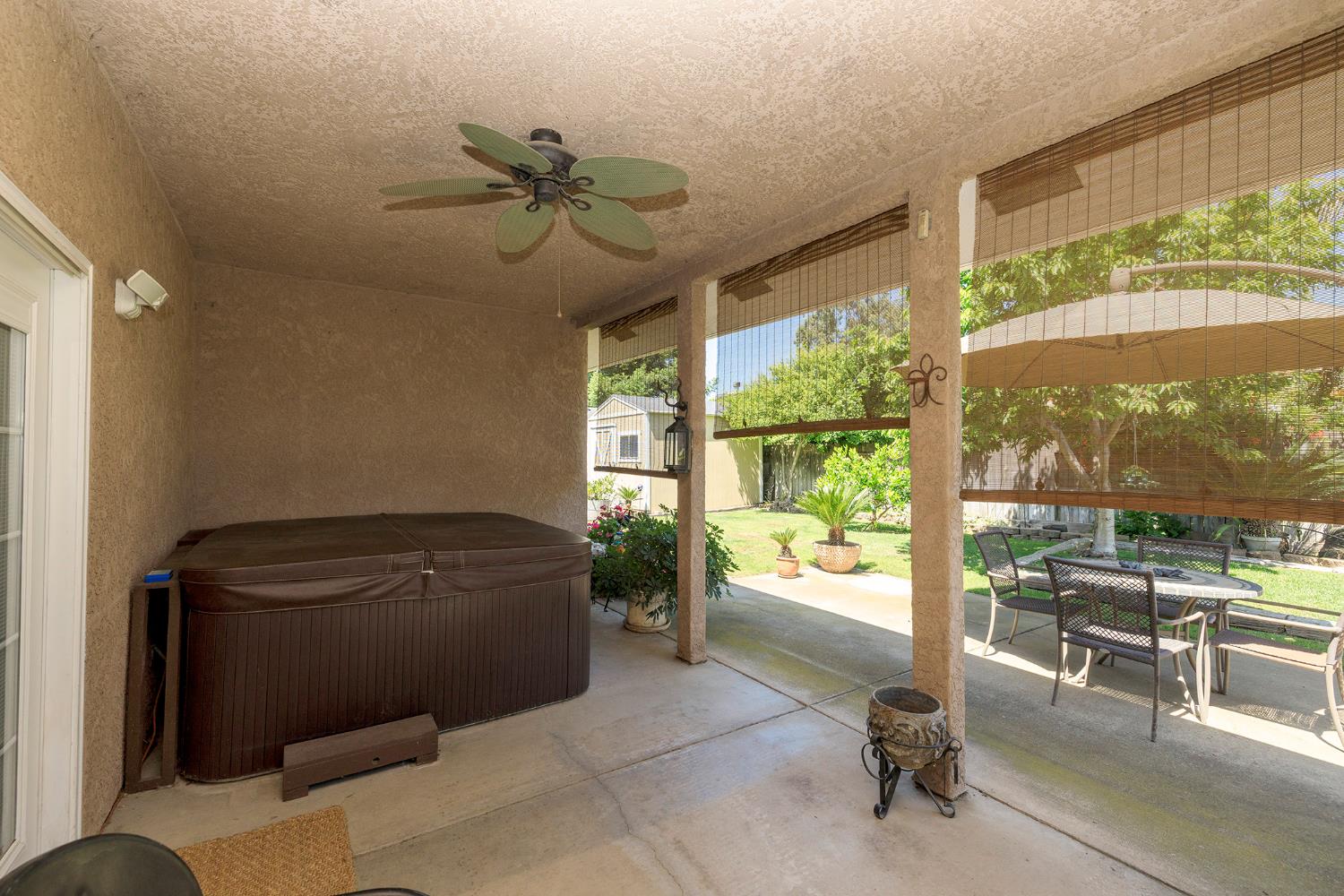 3731 Incline Way Riverbank, CA 95367 - Photo 33 of 49 a bedroom with a bed and a floor to ceiling window