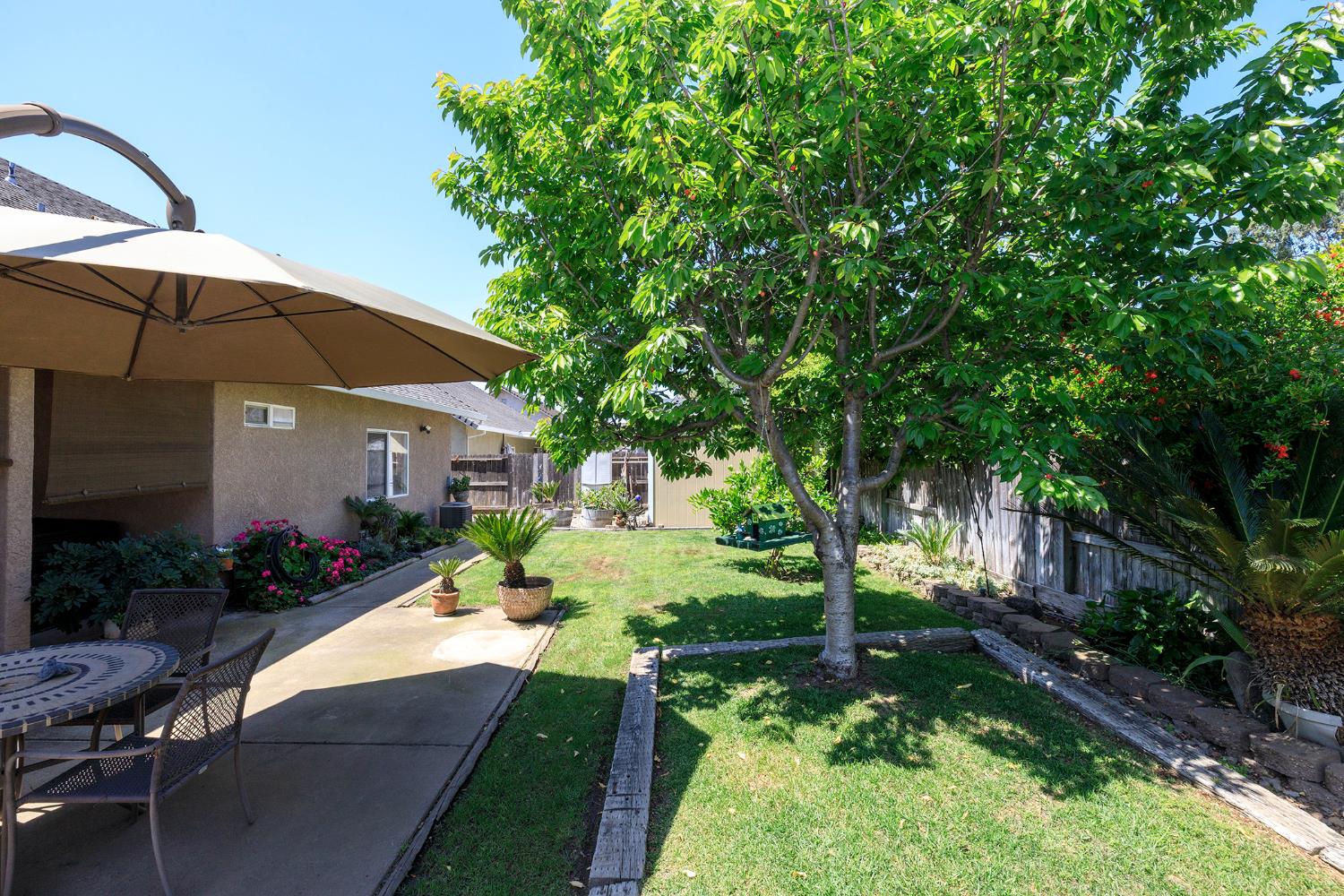 3731 Incline Way Riverbank, CA 95367 - Photo 38 of 49 a view of a house with backyard and sitting area