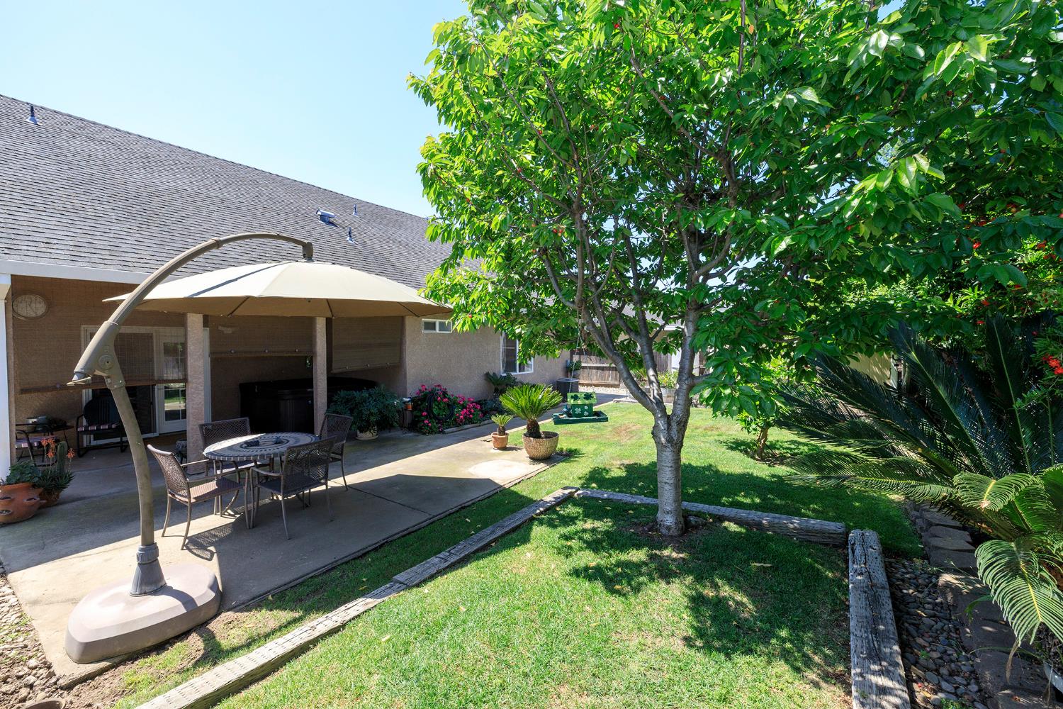 3731 Incline Way Riverbank, CA 95367 - Photo 39 of 49 a view of a house with backyard porch and sitting area