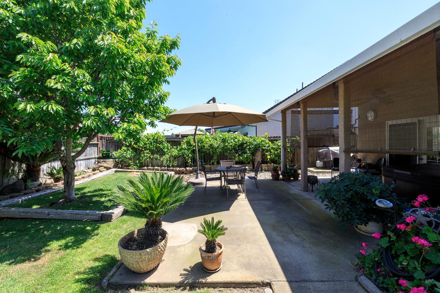 3731 Incline Way Riverbank, CA 95367 - Photo 41 of 49 a view of a patio with couches chair and potted plants