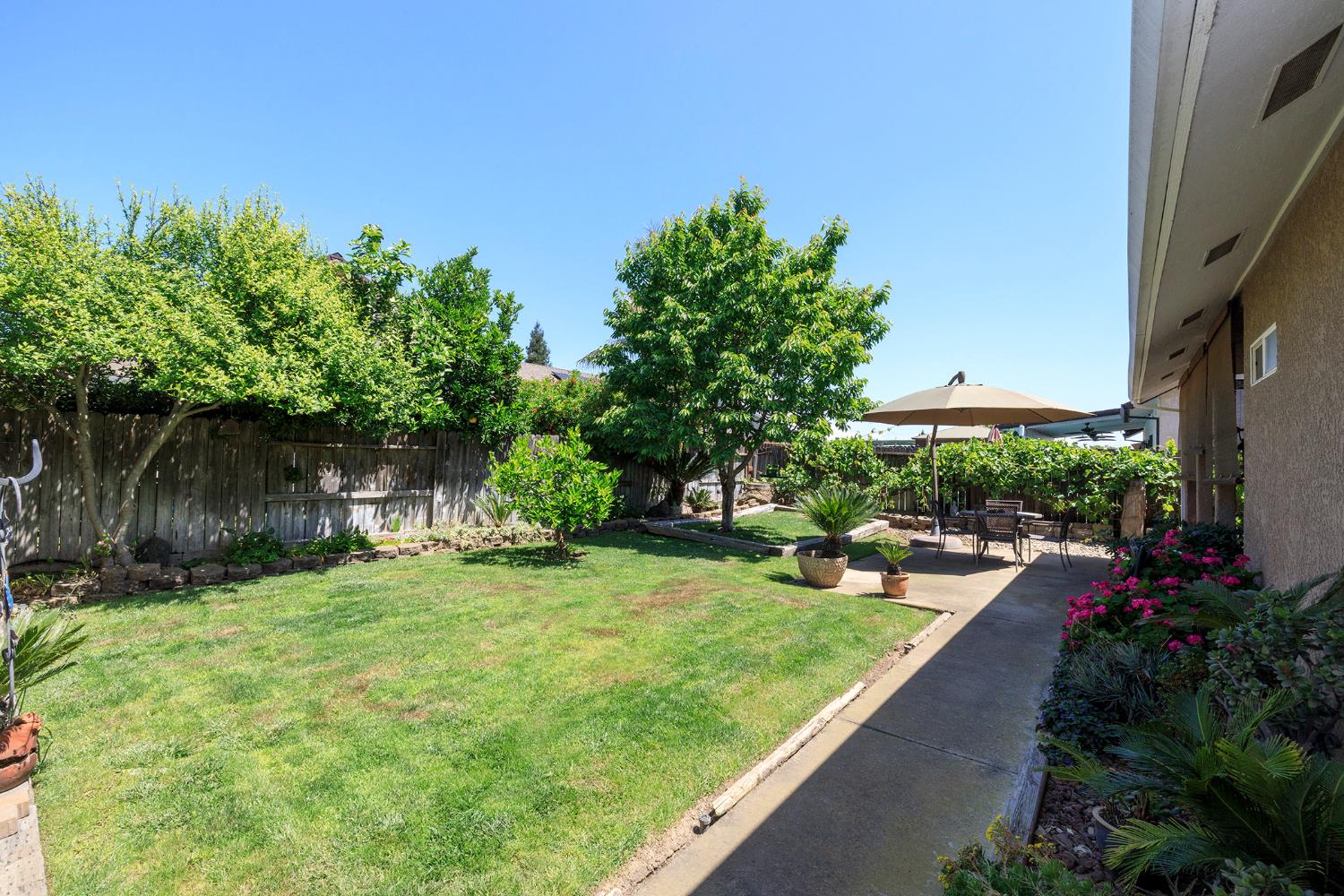 3731 Incline Way Riverbank, CA 95367 - Photo 42 of 49 a view of a backyard with a garden