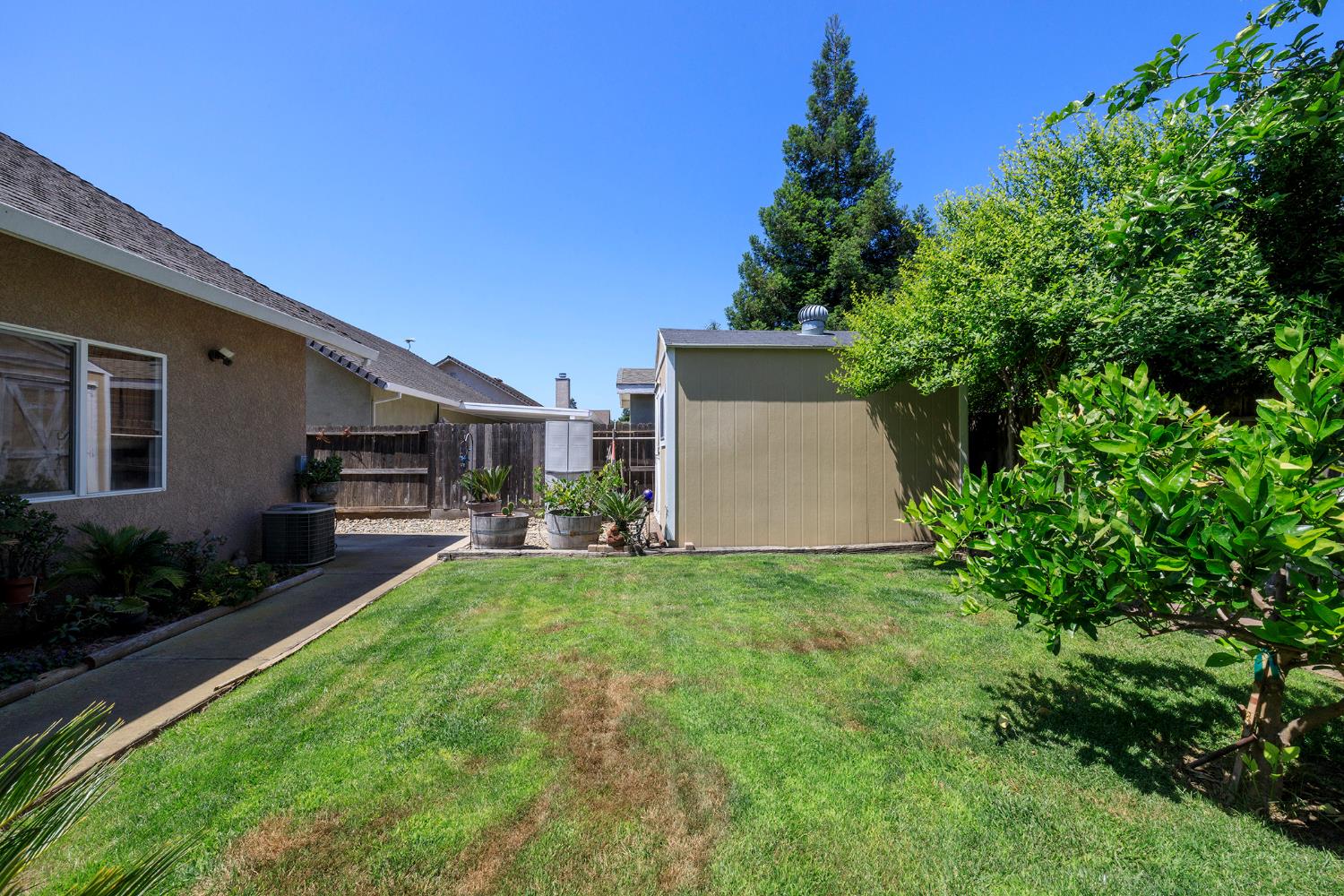 3731 Incline Way Riverbank, CA 95367 - Photo 46 of 49 a view of a house with backyard and sitting area