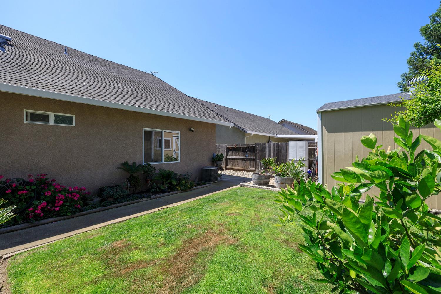 3731 Incline Way Riverbank, CA 95367 - Photo 47 of 49 a front view of house with yard and outdoor seating