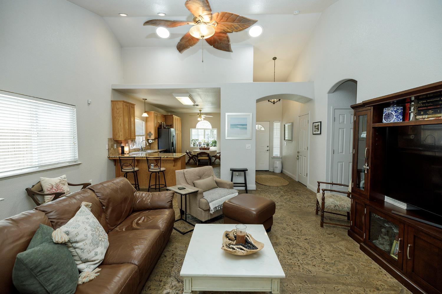 3731 Incline Way Riverbank, CA 95367 - Photo 7 of 49 a living room with furniture a flat screen tv and a window