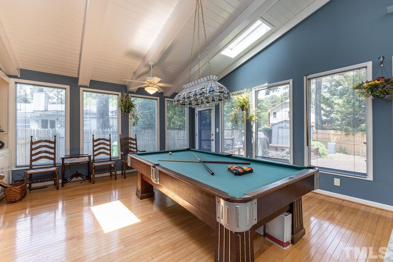 4808 Waybridge Court Raleigh, NC 27606 - Photo 14 of 29 a room with pool table and windows