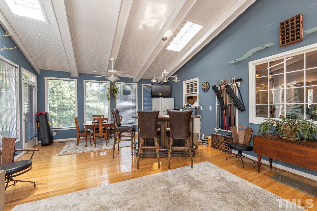 4808 Waybridge Court Raleigh, NC 27606 - Photo 16 of 29 a dining room with lots of tables and chairs