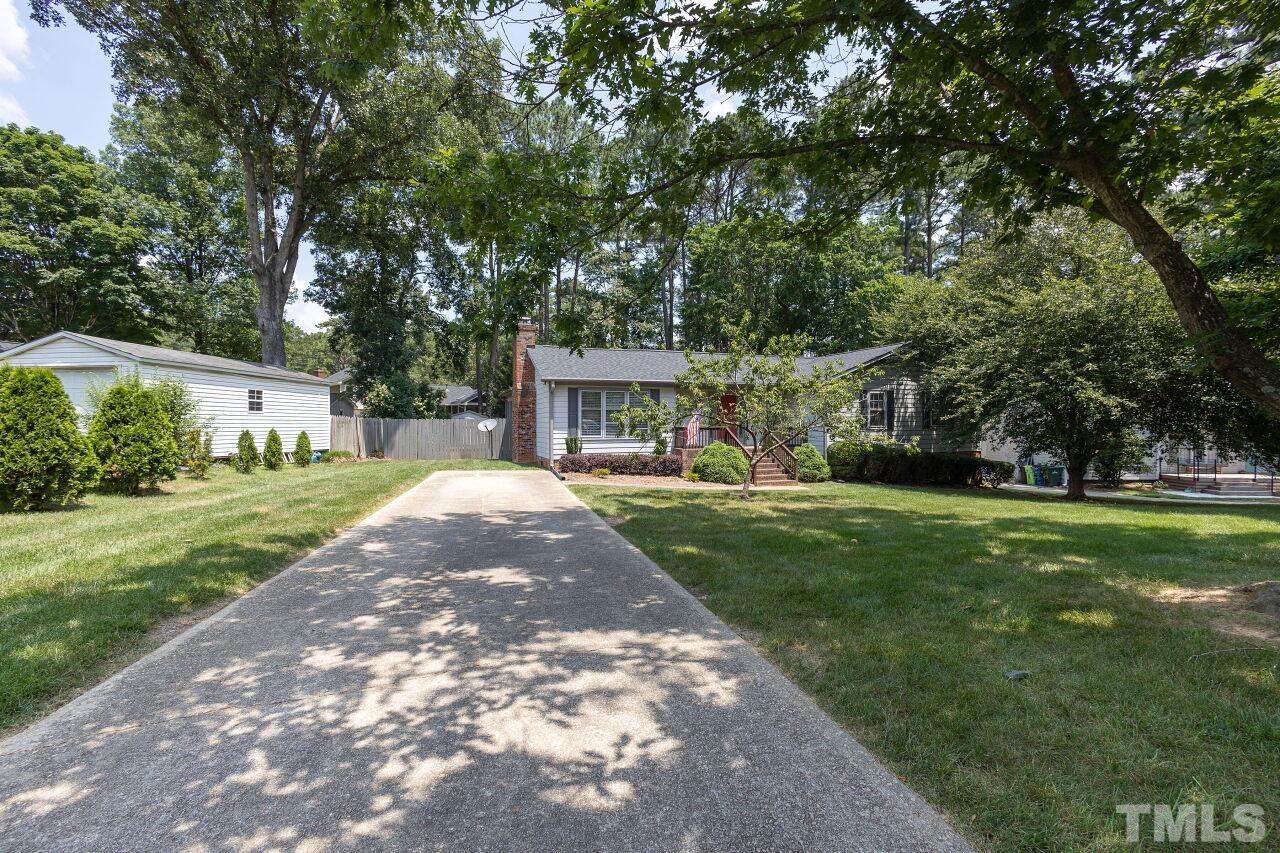 4808 Waybridge Court Raleigh, NC 27606 - Photo 2 of 29 a front view of a house with a yard