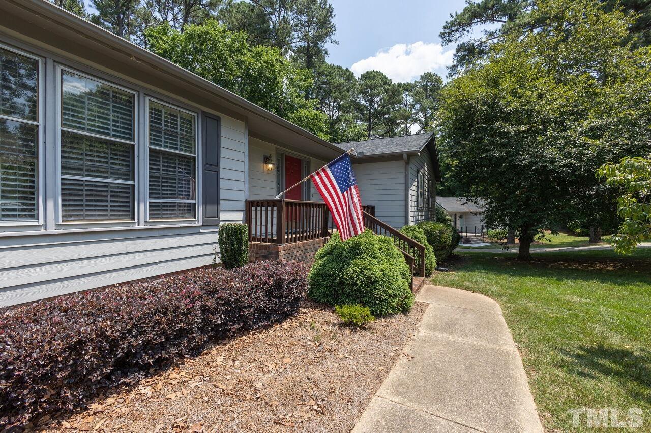 4808 Waybridge Court Raleigh, NC 27606 - Photo 3 of 29 a front view of a house with garden