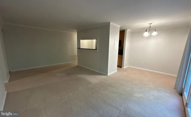 an empty room with a bathroom