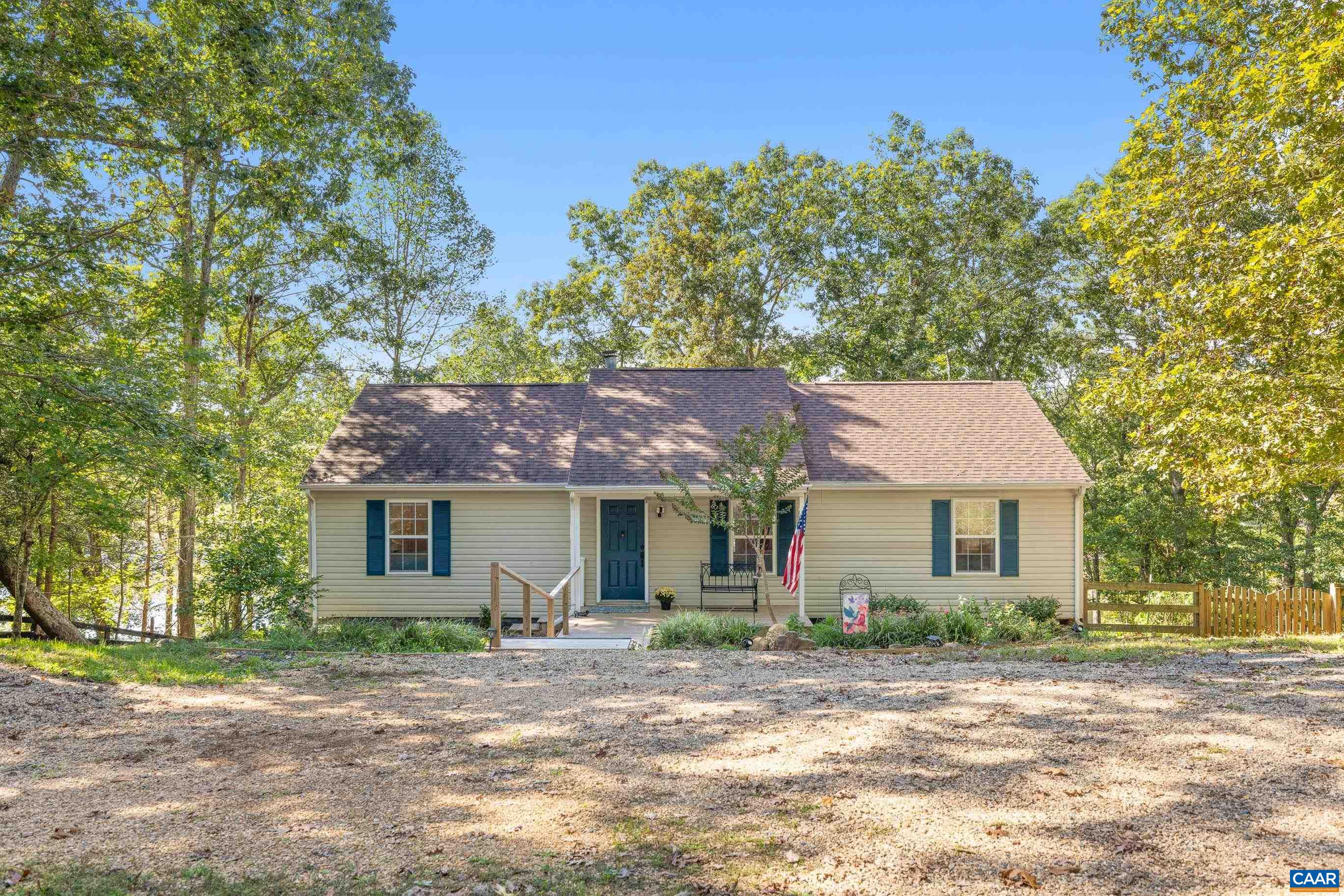 528 Jonquil Road Ruckersville, VA 22968 - Photo 3 of 66 a front view of a house with a garden