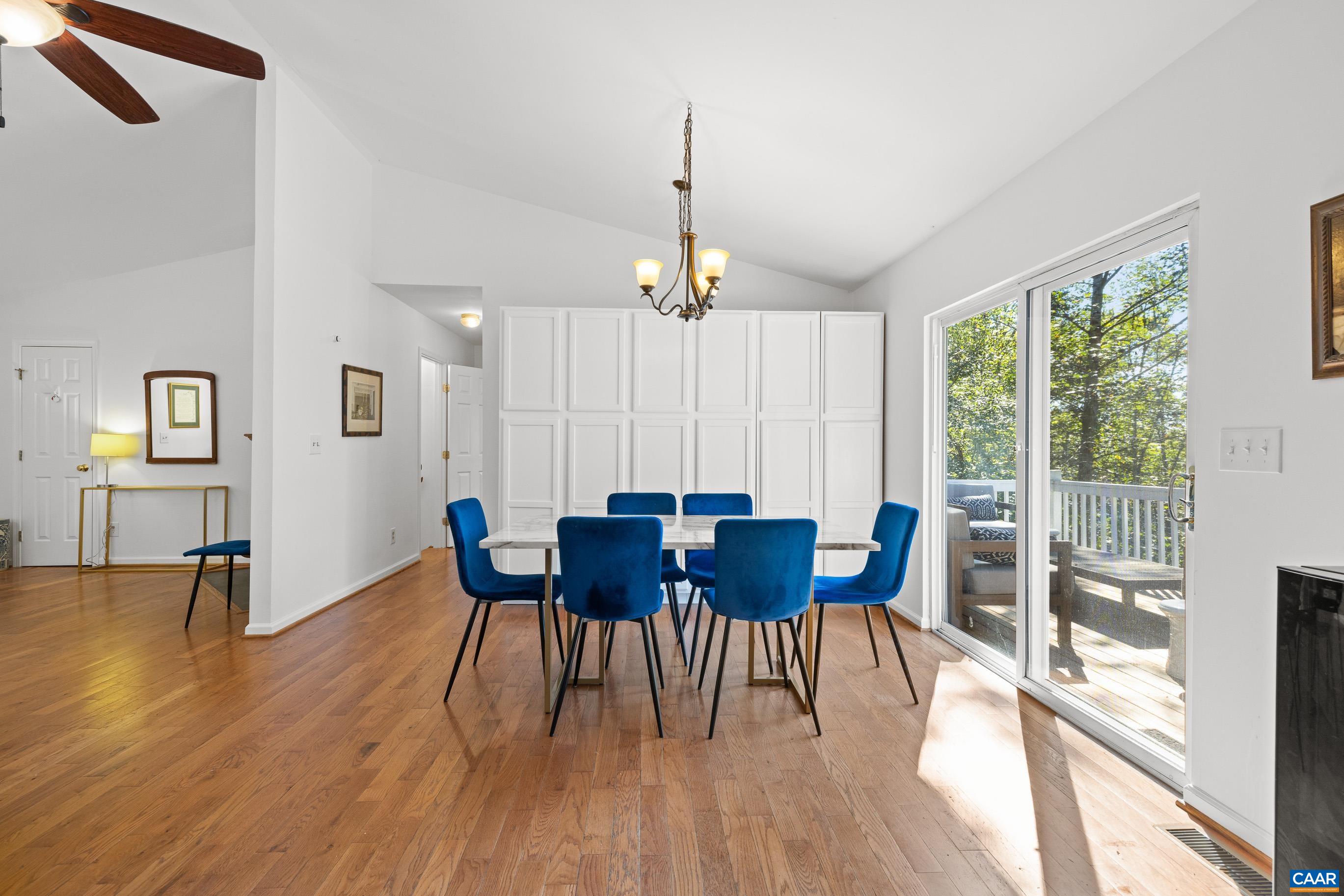 528 Jonquil Road Ruckersville, VA 22968 - Photo 39 of 66 a view of a dining room with furniture window and wooden floor
