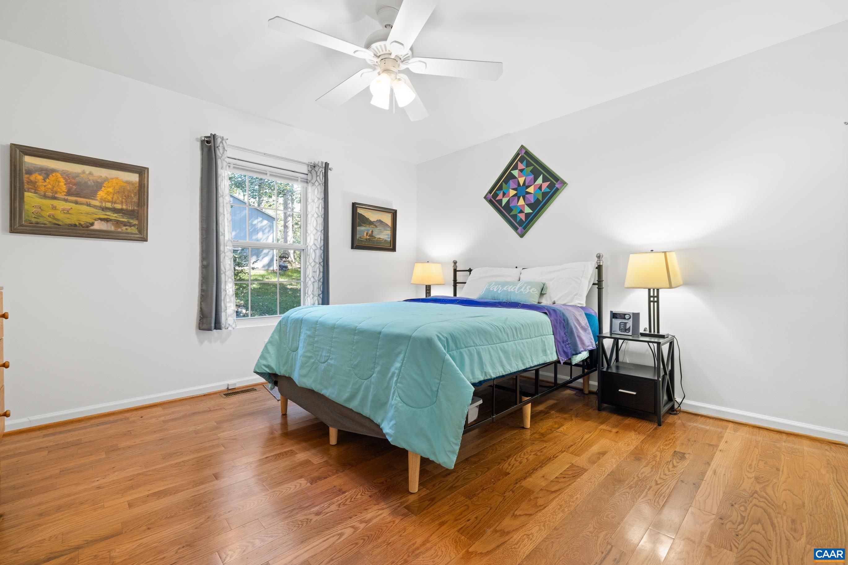 528 Jonquil Road Ruckersville, VA 22968 - Photo 46 of 66 a bedroom with a bed and a window