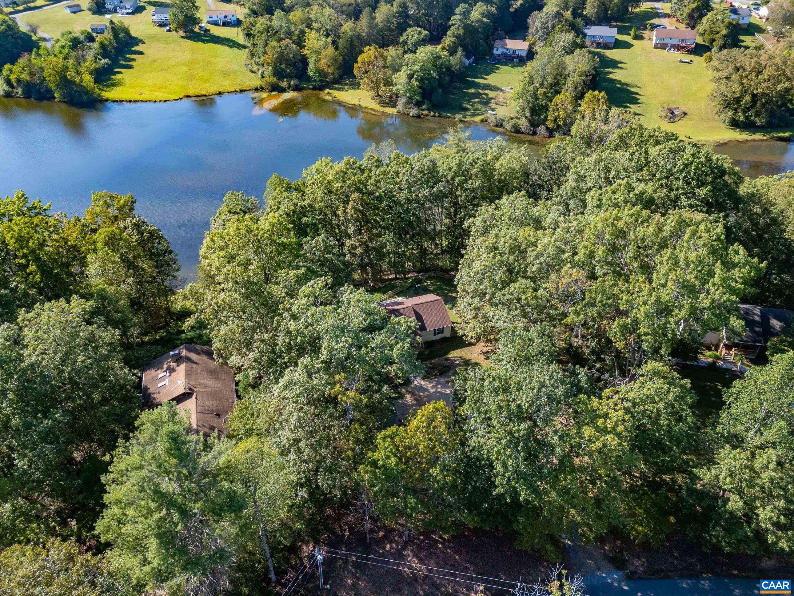 528 Jonquil Road Ruckersville, VA 22968 - Photo 57 of 66 an aerial view of residential house with outdoor space and swimming pool