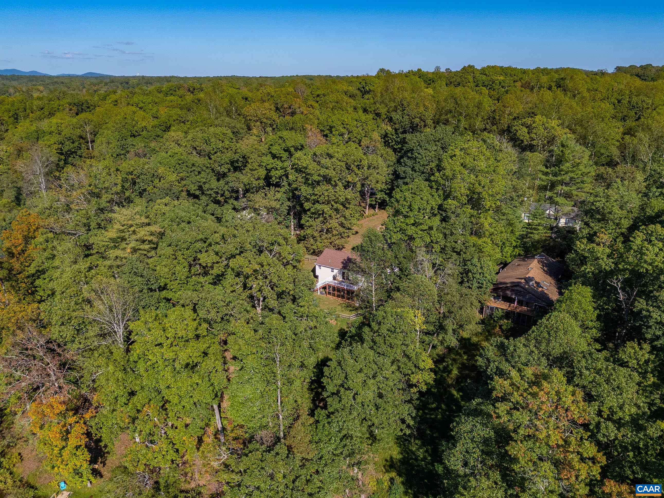 528 Jonquil Road Ruckersville, VA 22968 - Photo 62 of 66 an aerial view of residential houses with outdoor space and trees