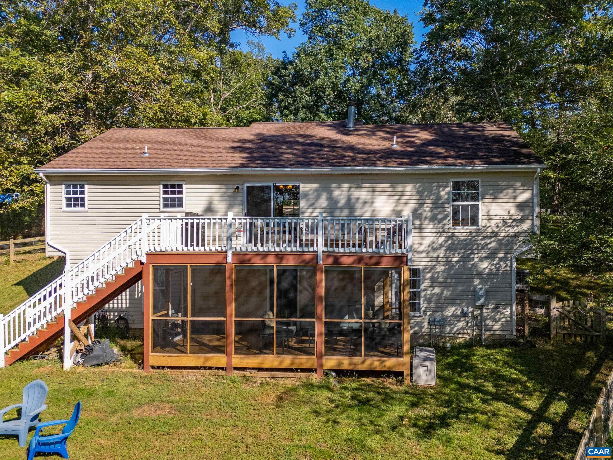 528 Jonquil Road Ruckersville, VA 22968 - Photo 66 of 66 a view of a house with a window and a yard