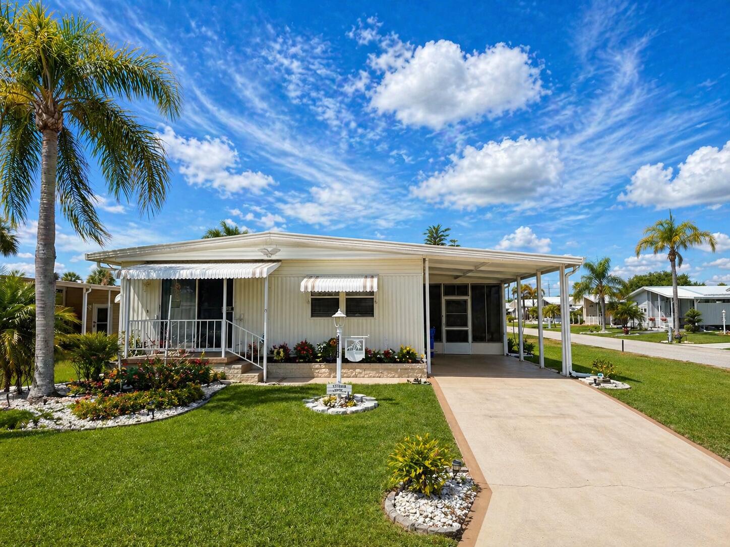 2713 Roger Street Sebring, FL 33872 - Photo 2 of 2 a front view of house with yard and green space