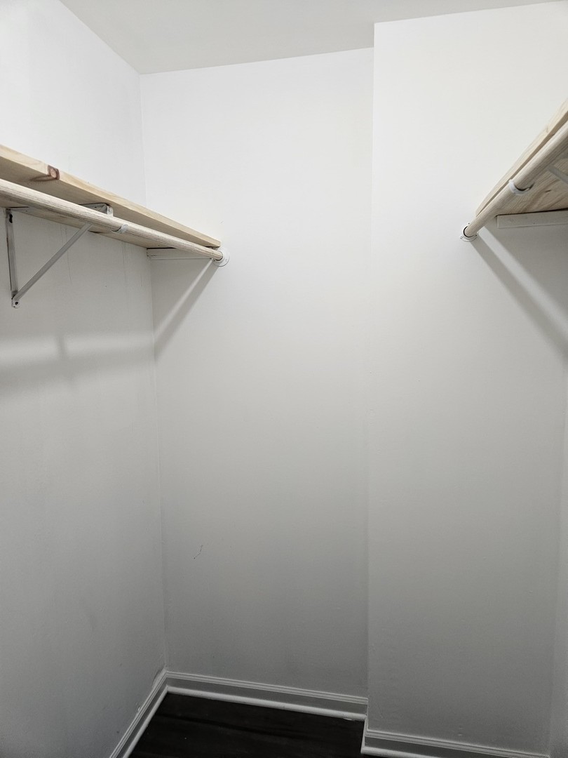 17612 Wright Street Lansing, IL 60438 - Photo 33 of 40 a view of small space with racks on the wall