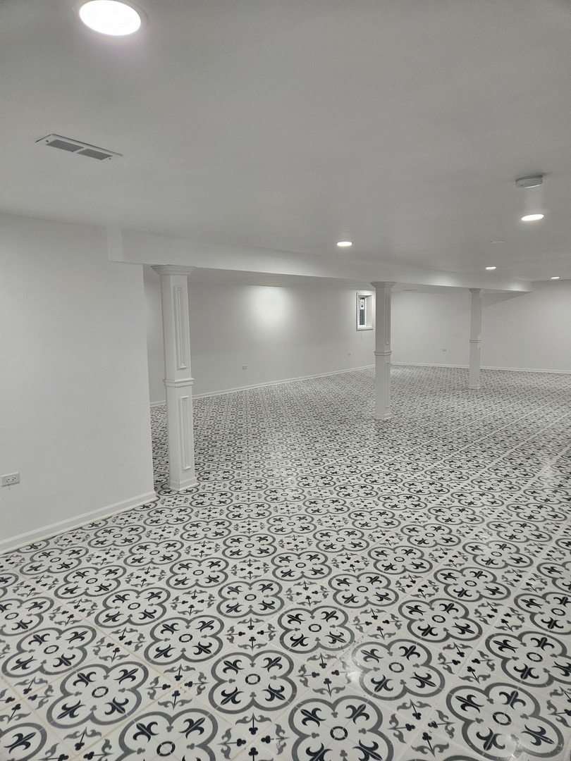 17612 Wright Street Lansing, IL 60438 - Photo 36 of 40 a bathroom with a shower