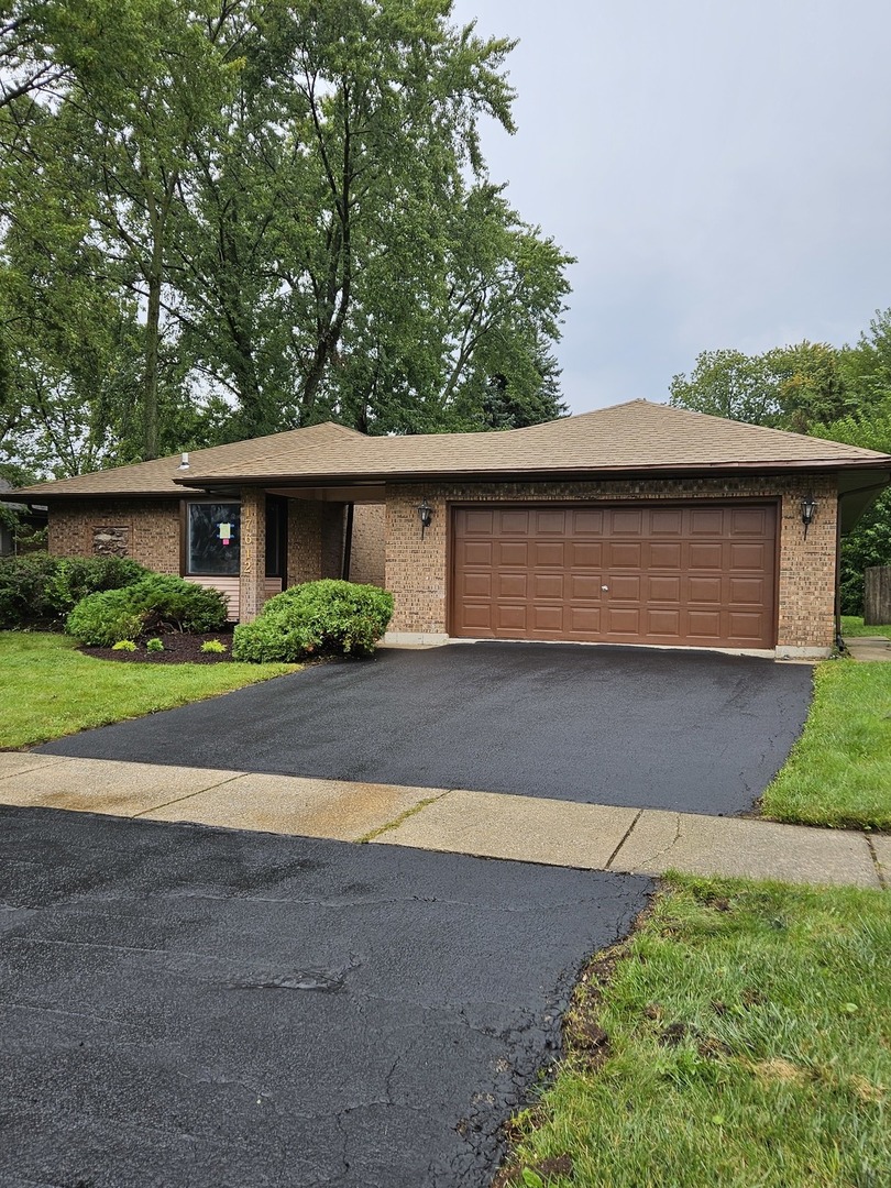 17612 Wright Street Lansing, IL 60438 - Photo 38 of 40 a front view of house with yard and green space