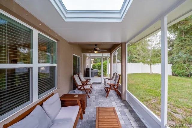 a view of backyard with cabin