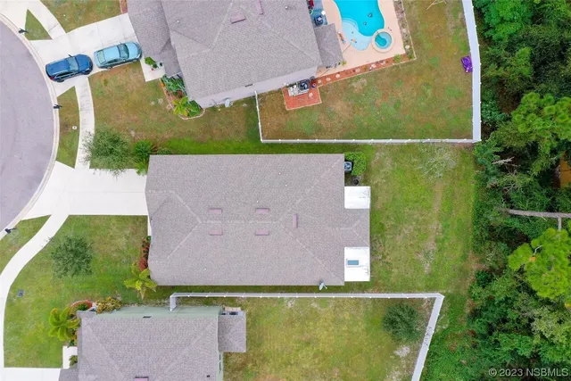 an aerial view of multiple house