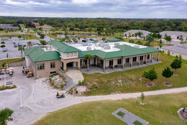 a view of a swimming pool with a garden