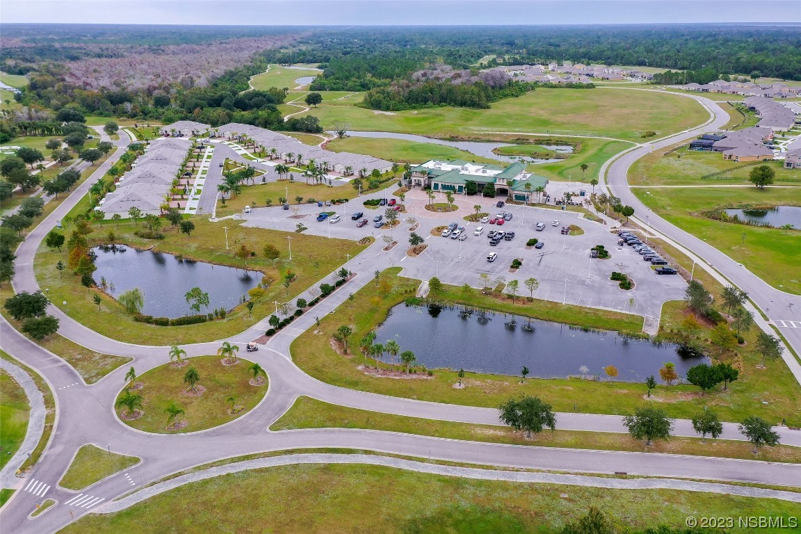 4283 Starling Place Mims, FL 32754 - Photo 37 of 40 an aerial view of a swimming pool and outdoor space